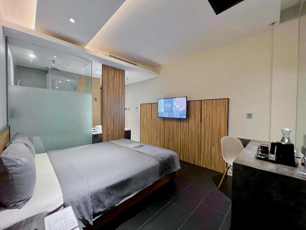 Postel nebo postele na pokoji v ubytování Erian Hotel