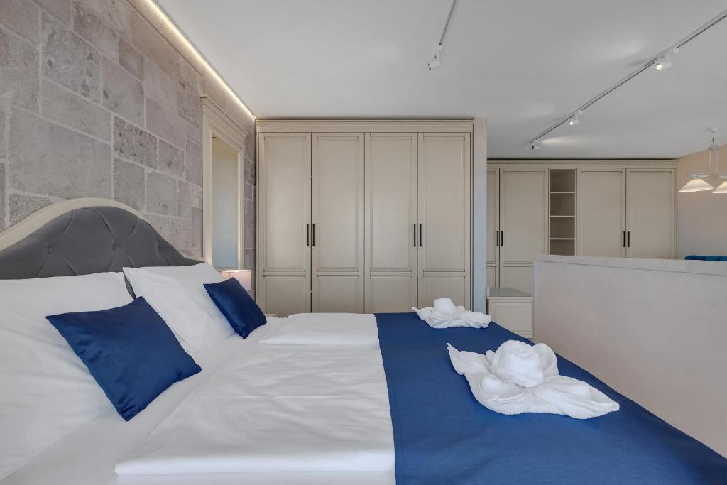 Postel nebo postele na pokoji v ubytování Heritage Hotel Liberan