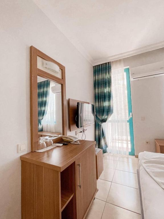 Postel nebo postele na pokoji v ubytování Wonder Life Hotel