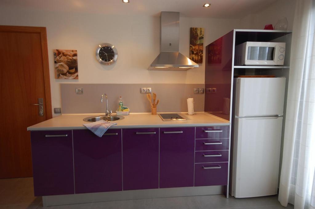 Kuchyň nebo kuchyňský kout v ubytování Sitges Apartment