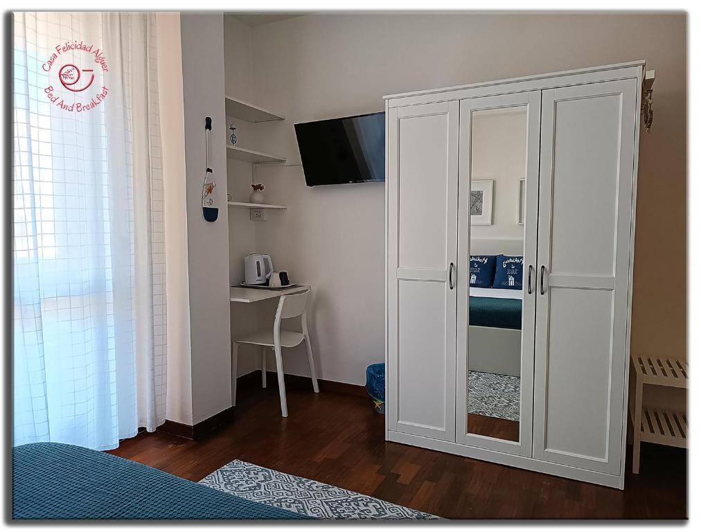 Posteľ alebo postele v izbe v ubytovaní Casa Felicidad Alguer