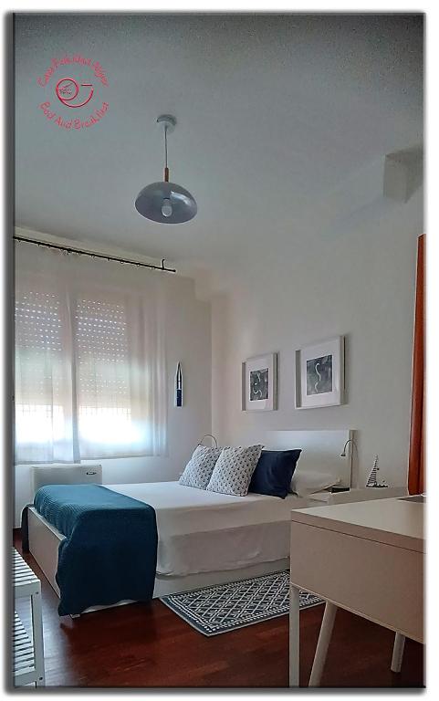 Posteľ alebo postele v izbe v ubytovaní Casa Felicidad Alguer