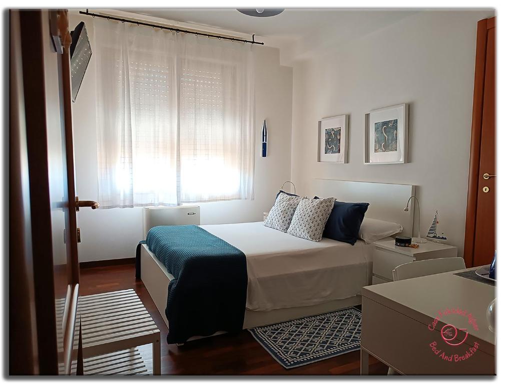 Posteľ alebo postele v izbe v ubytovaní Casa Felicidad Alguer