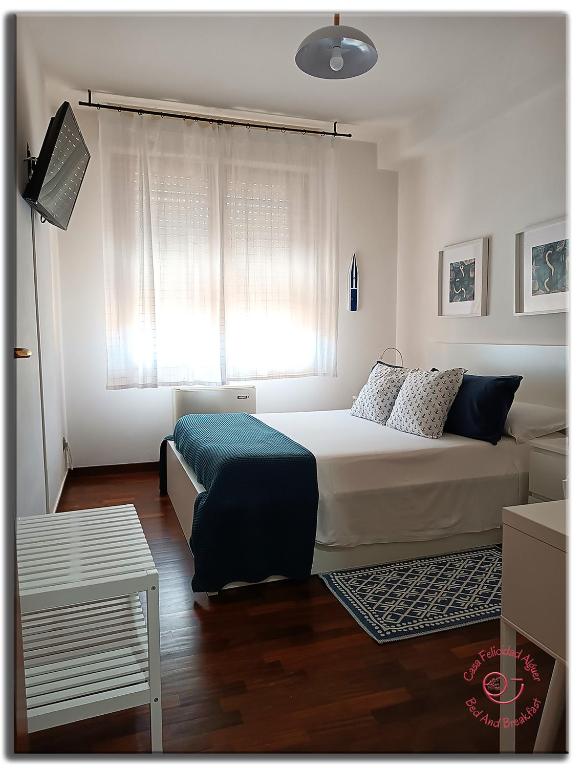 Posteľ alebo postele v izbe v ubytovaní Casa Felicidad Alguer