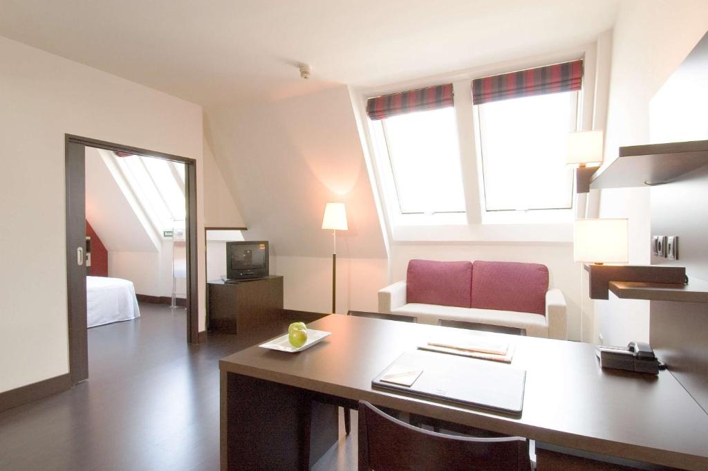Kuchyň nebo kuchyňský kout v ubytování NH Wien City