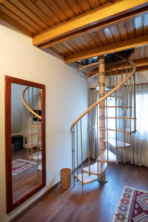 Postel nebo postele na pokoji v ubytování Casa Cheile Dâmbovicioarei - Cabana 1