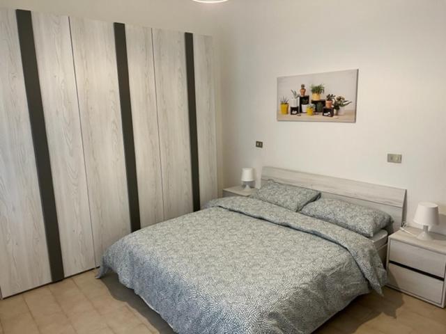 Łóżko lub łóżka w pokoju w obiekcie La casa sui colli bolognesi