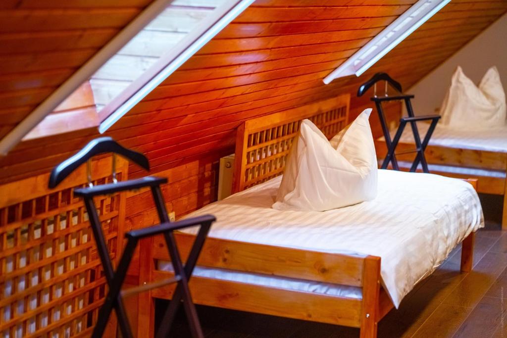 Postel nebo postele na pokoji v ubytování Casa Cheile Dâmbovicioarei - Cabana 2