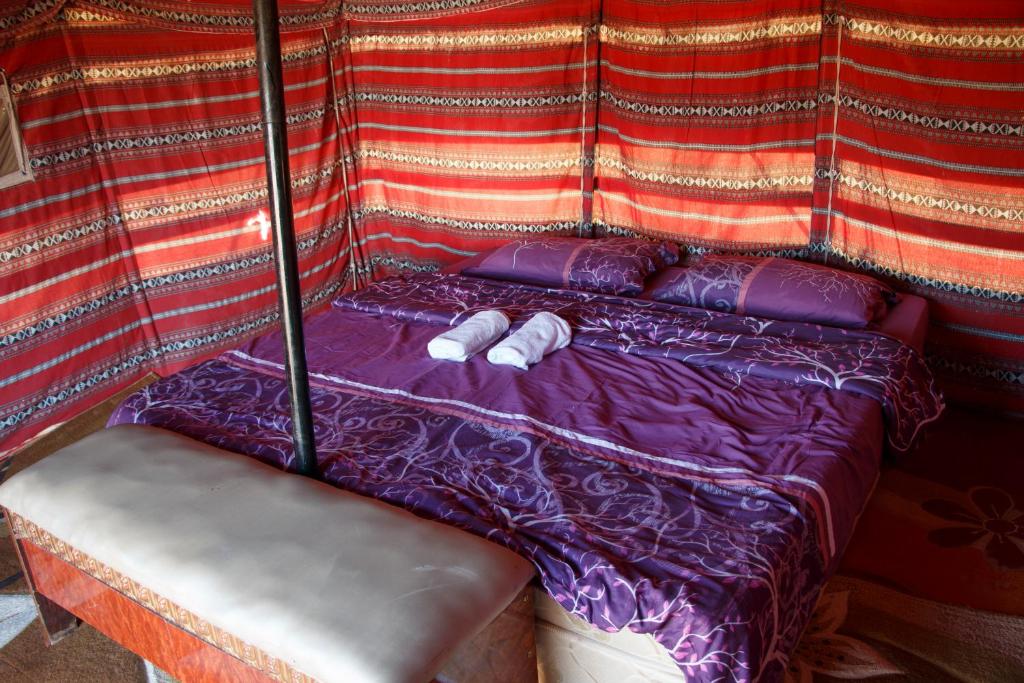 Postel nebo postele na pokoji v ubytování wahiba Bedouiens privae Camp