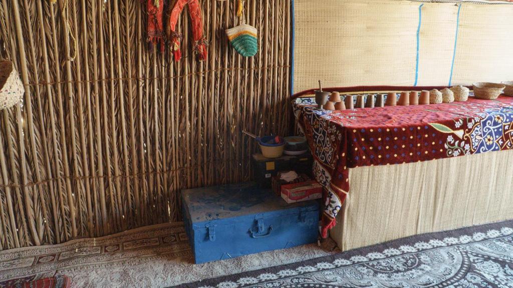 Postel nebo postele na pokoji v ubytování wahiba Bedouiens privae Camp