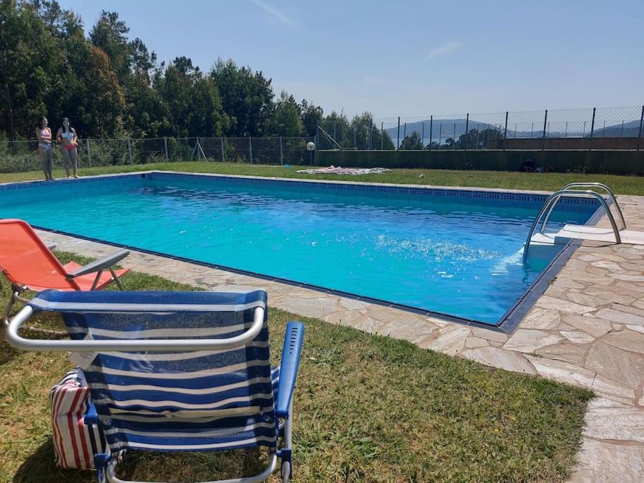 The swimming pool at or close to APARTAMENTO PLAYA DE ESTORDE - Piscina y playa en el corazon da Costa da Morte