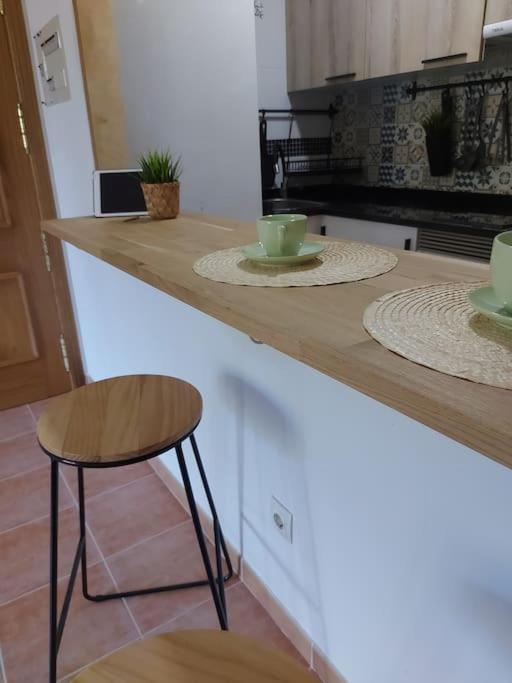 A kitchen or kitchenette at APARTAMENTO PLAYA DE ESTORDE - Piscina y playa en el corazon da Costa da Morte