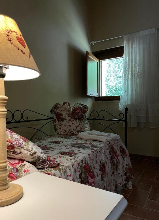 Postel nebo postele na pokoji v ubytování Le Farine Del Maestro