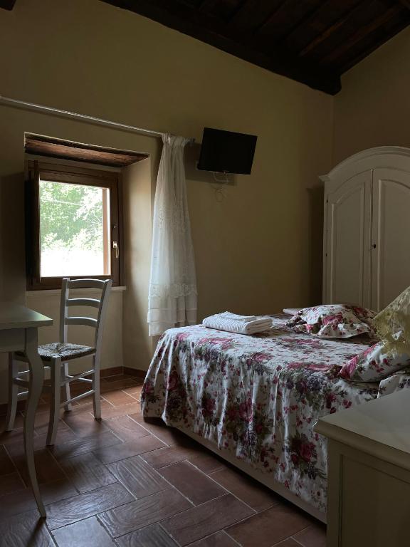 Postel nebo postele na pokoji v ubytování Le Farine Del Maestro