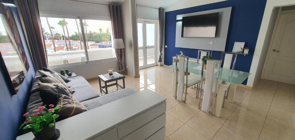 TV a/nebo společenská místnost v ubytování La Rosa de los vientos luxury apartment