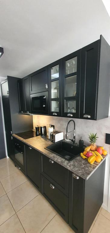 Kuchyň nebo kuchyňský kout v ubytování La Rosa de los vientos luxury apartment