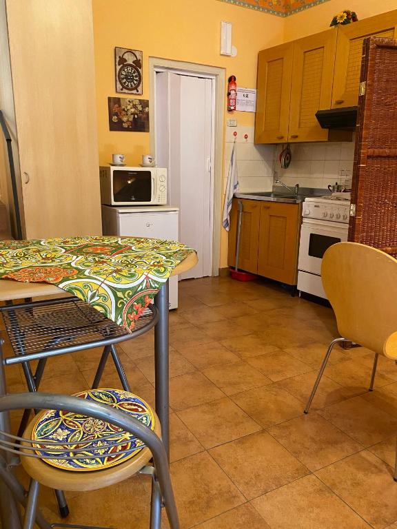 Kuchyň nebo kuchyňský kout v ubytování Cottage Gole Alcantara Gloria Room