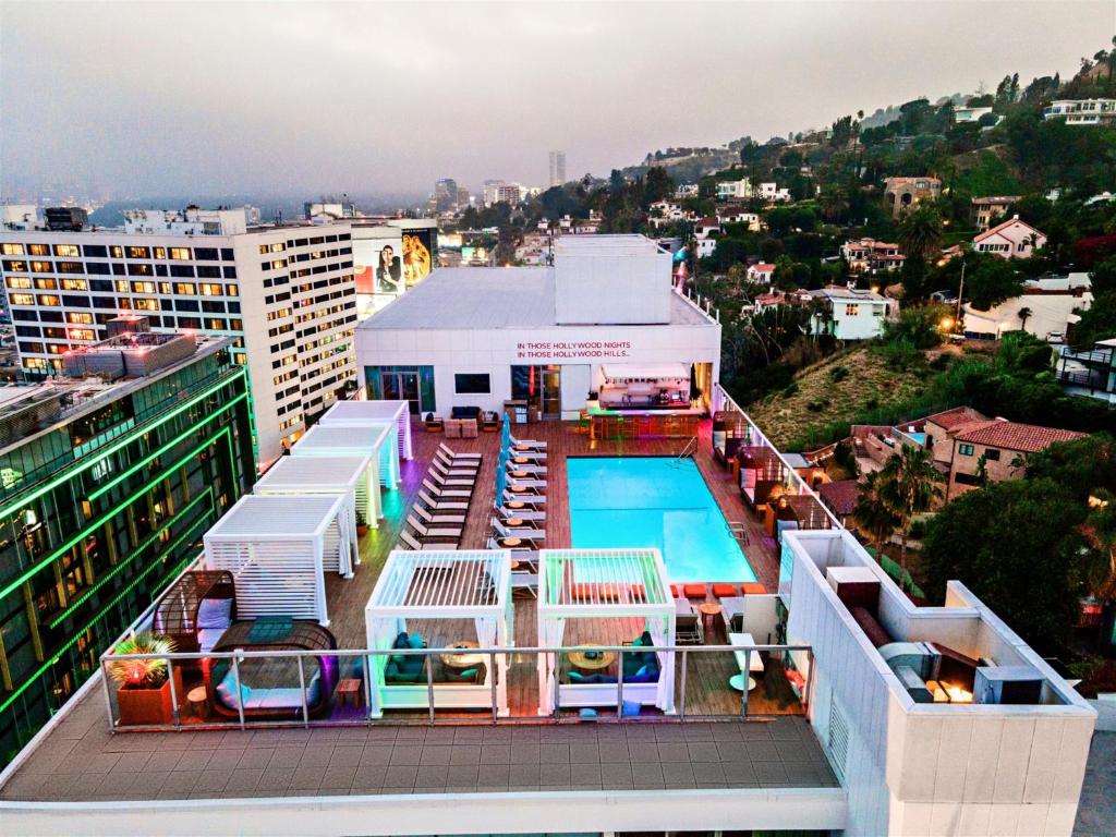 an aerial view of a pool on top of a building at Andaz West Hollywood-a concept by Hyatt in Los Angeles