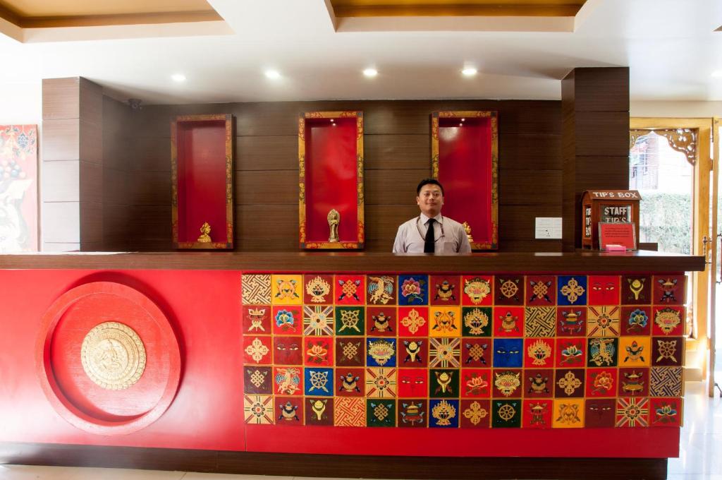 Členové personálu v ubytování Mandala Boutique Hotel