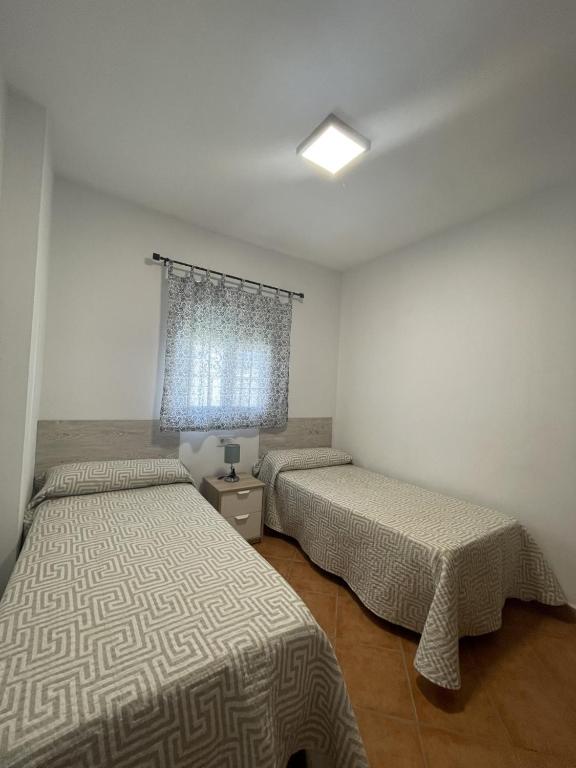 Posteľ alebo postele v izbe v ubytovaní CASA SUROESTE