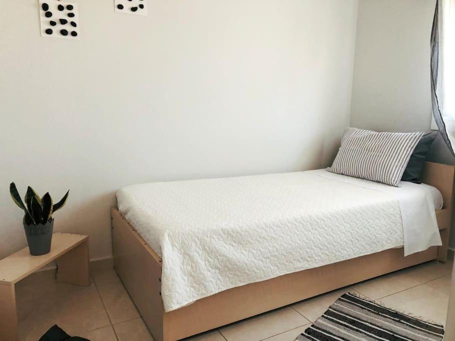 Posteľ alebo postele v izbe v ubytovaní Riviera