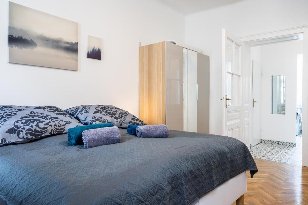Postel nebo postele na pokoji v ubytování revLIVING Apartments Eggenburg