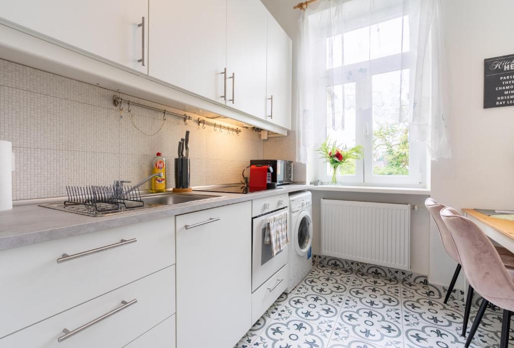 Kuchyň nebo kuchyňský kout v ubytování revLIVING Apartments Eggenburg