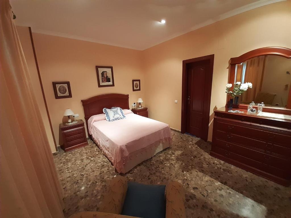 Posteľ alebo postele v izbe v ubytovaní Casa Rural Pariente