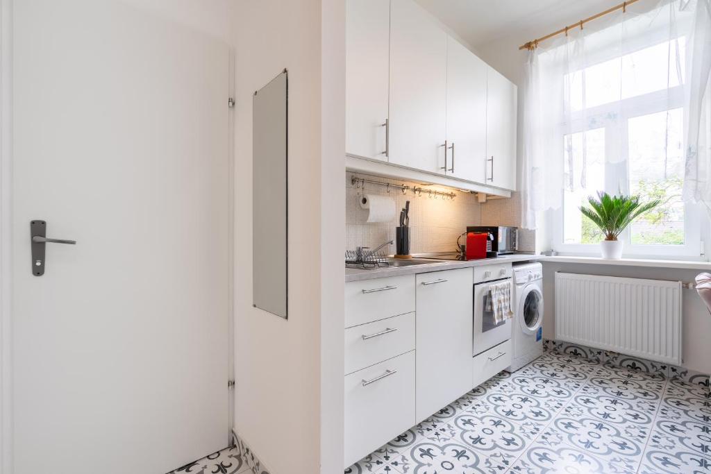 Kuchyň nebo kuchyňský kout v ubytování revLIVING Apartments Eggenburg