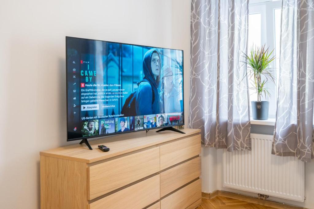 TV a/nebo společenská místnost v ubytování revLIVING Apartments Eggenburg