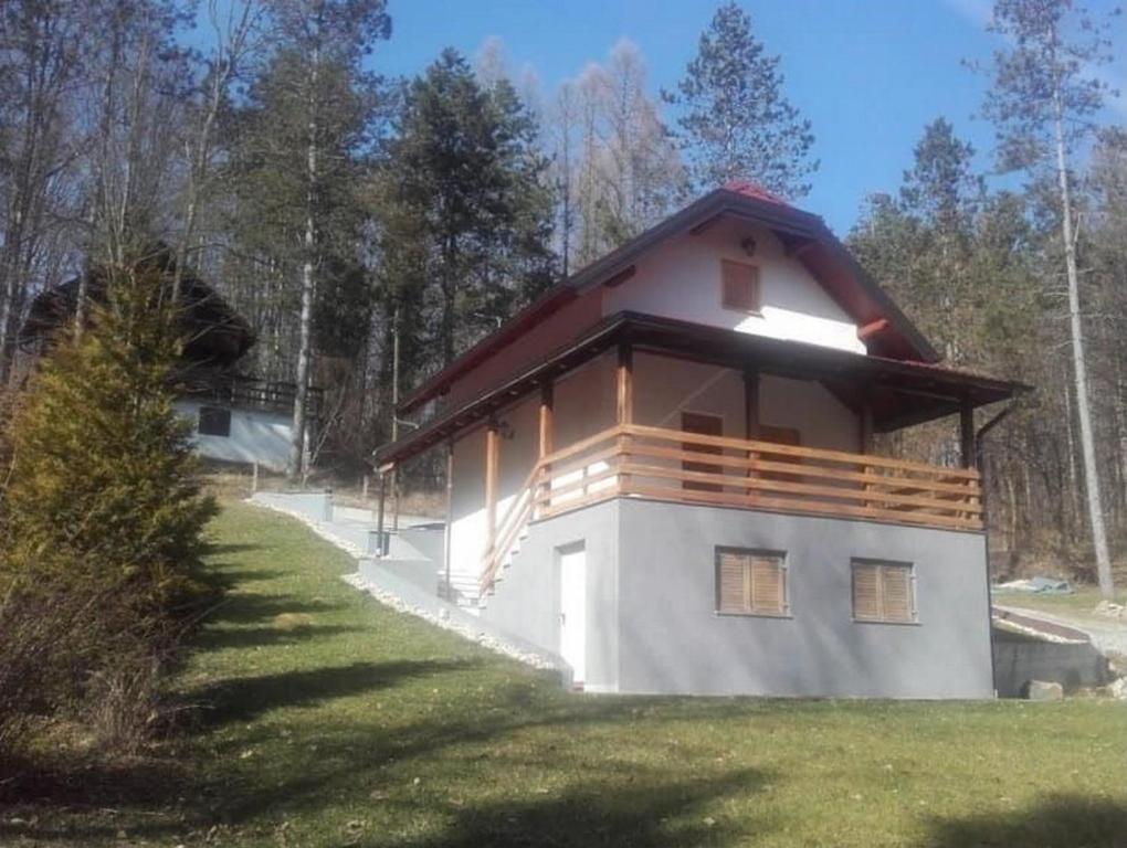a small house with a roof on a grass field at Family friendly house with a parking space Garesnica, Bjelovarska - 19166 in Garešnica