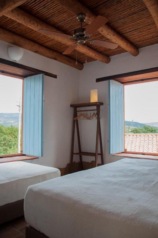 Voodi või voodid majutusasutuse Casa Guatí toas