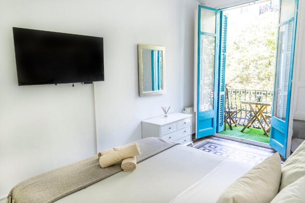 Postel nebo postele na pokoji v ubytování B-Garden BCN