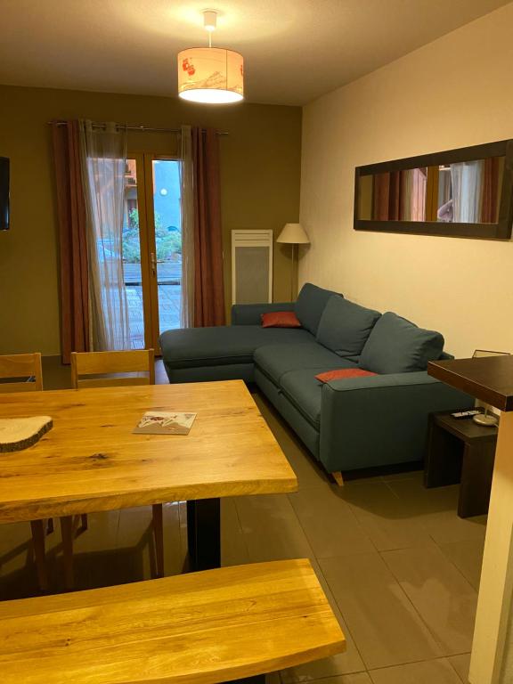 Posezení v ubytování Appartement en centre ville à 30m du télécabine