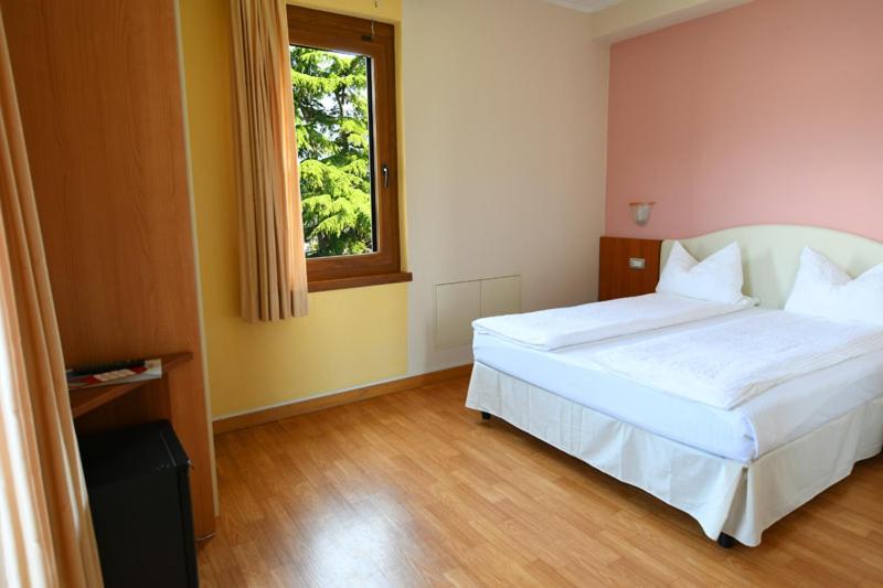 Postel nebo postele na pokoji v ubytování Casa Antonelli