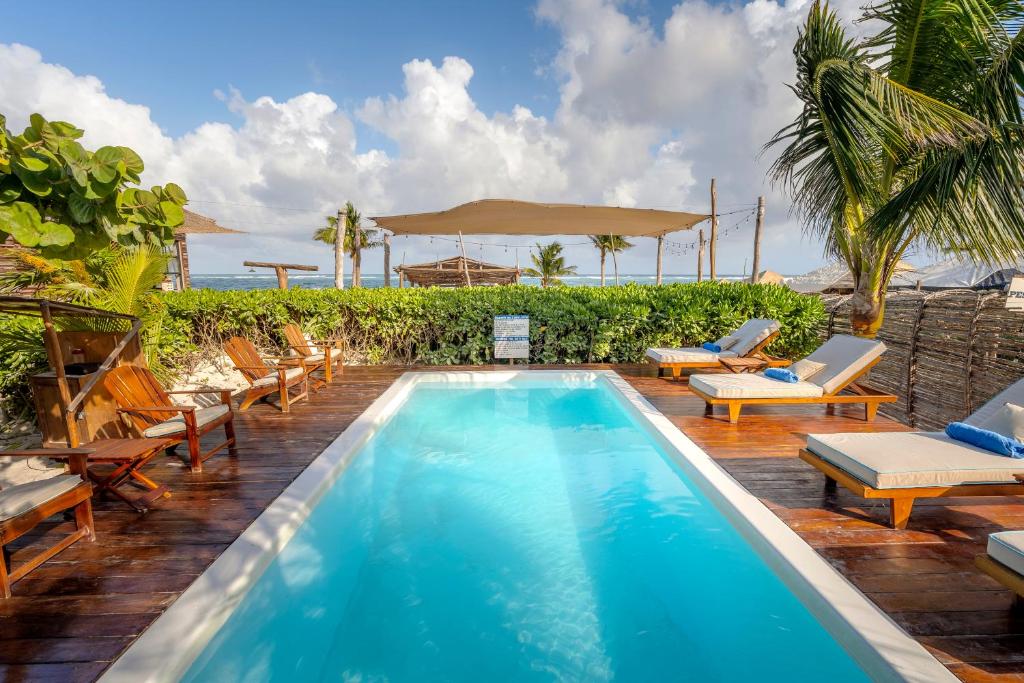 Бассейн в Villa Pescadores Tulum-Beachfront hotel by Ahau Collection или поблизости