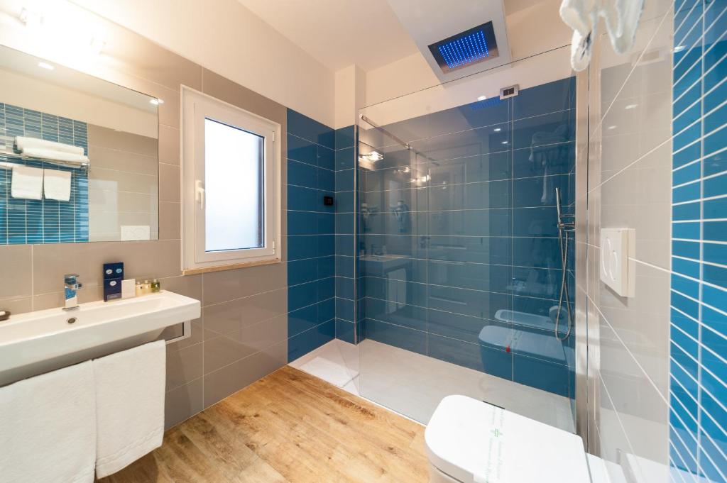 Koupelna v ubytování Trevi 41 Hotel