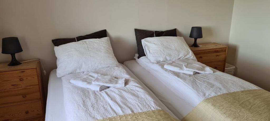 Postel nebo postele na pokoji v ubytování Guesthouse Stekkatún