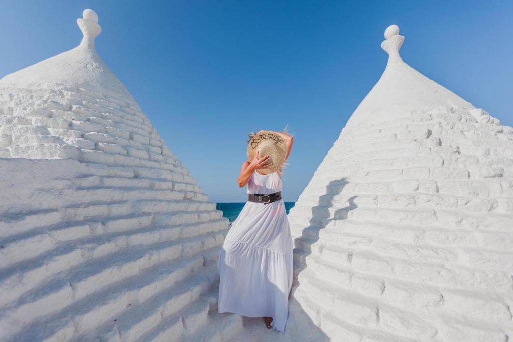 Hostia v ubytovaní Trulli sul Mare Forcatella