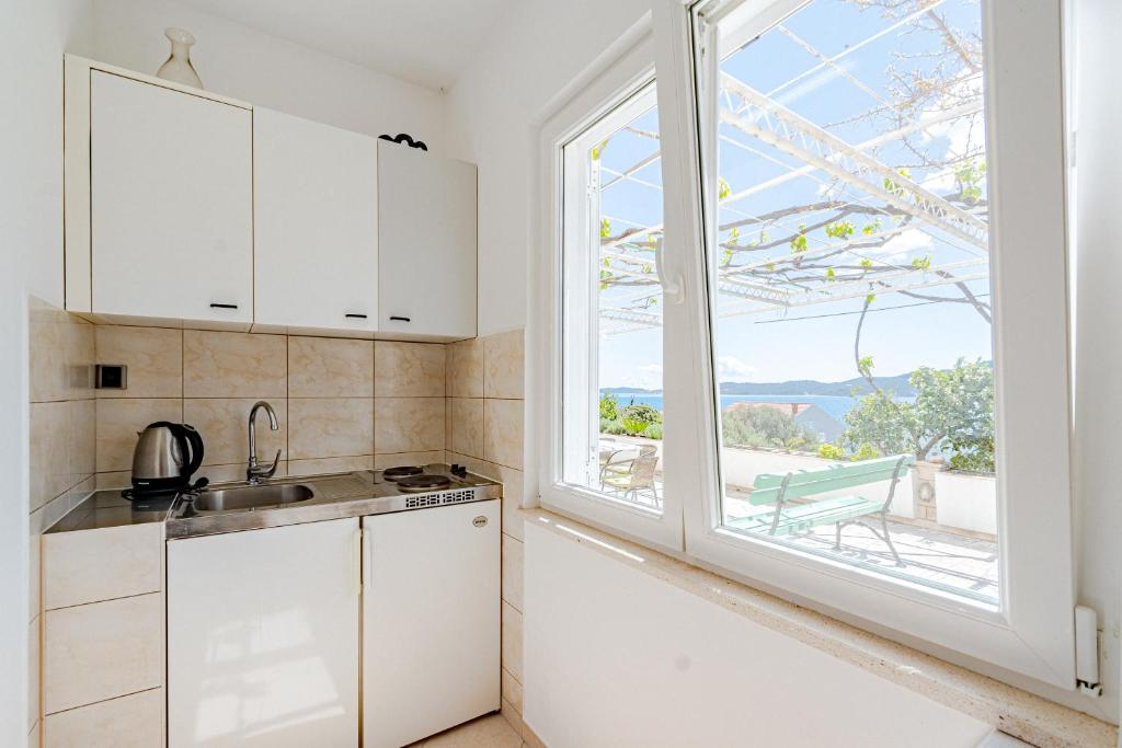 Kuchyň nebo kuchyňský kout v ubytování Apartments by the sea Viganj, Peljesac - 19391