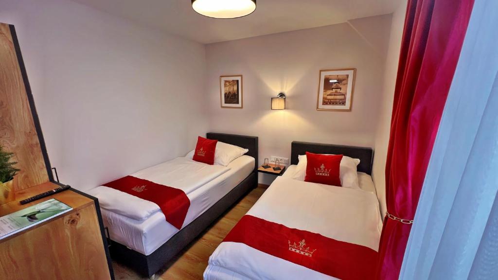 Postel nebo postele na pokoji v ubytování Hotel Zu den Drei Kronen