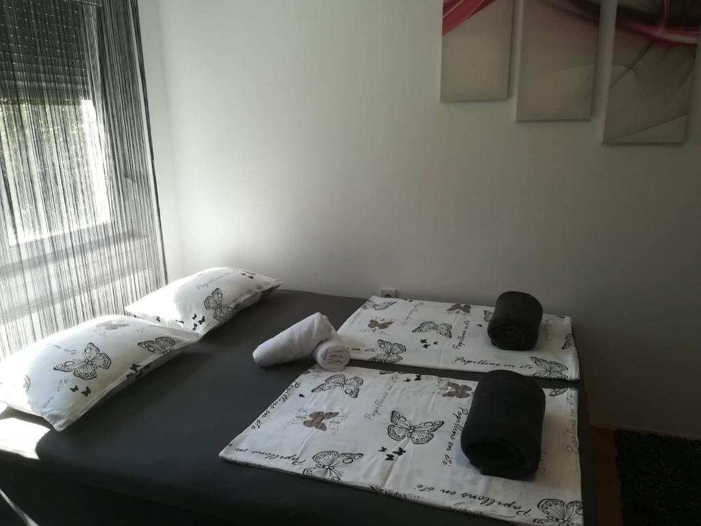 Postel nebo postele na pokoji v ubytování APARTMAN D&D***