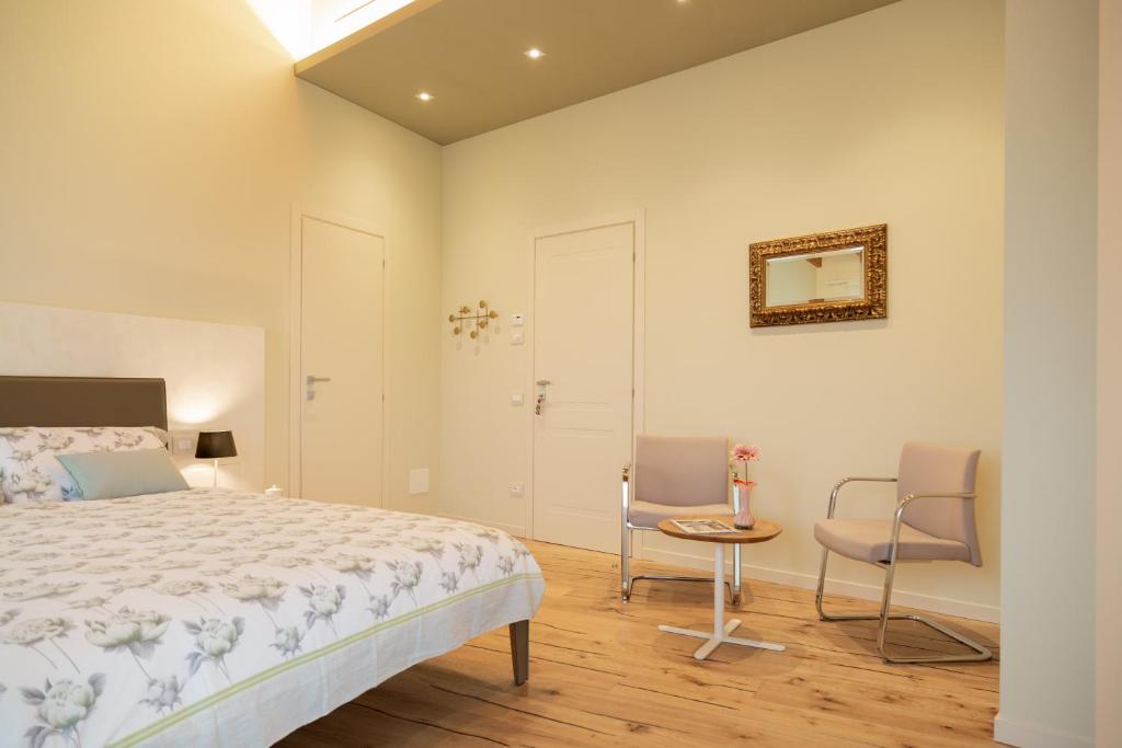 Postel nebo postele na pokoji v ubytování B&B Casa Pralunghi
