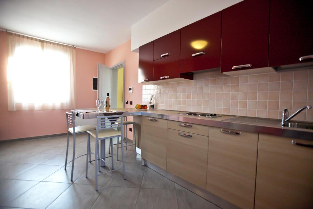 Kuchyňa alebo kuchynka v ubytovaní Hotel La Cartiera