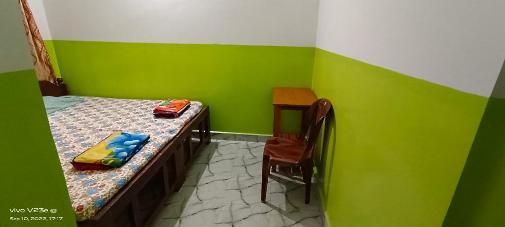 Postel nebo postele na pokoji v ubytování Luiza Guest House