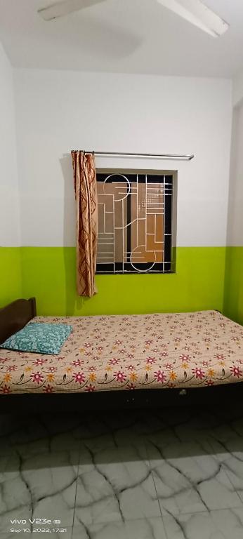 Postel nebo postele na pokoji v ubytování Luiza Guest House