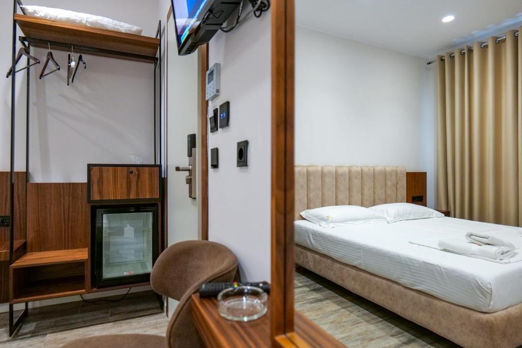 Postel nebo postele na pokoji v ubytování Hotel Semajo