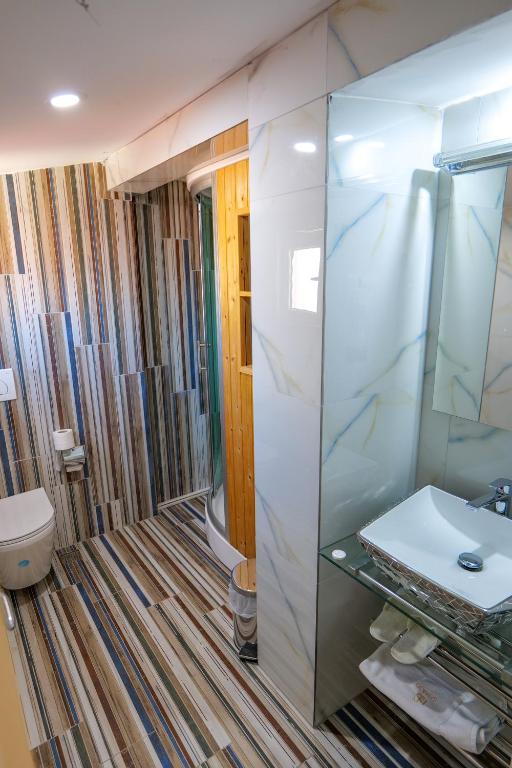 Koupelna v ubytování Hotel Semajo