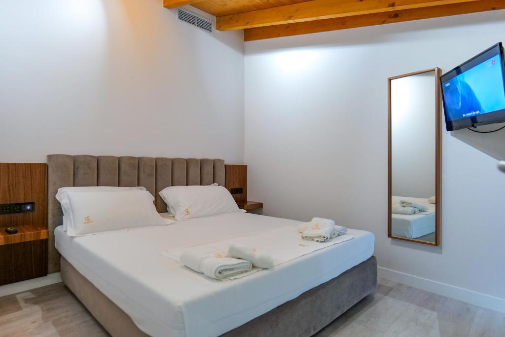 Postel nebo postele na pokoji v ubytování Hotel Semajo