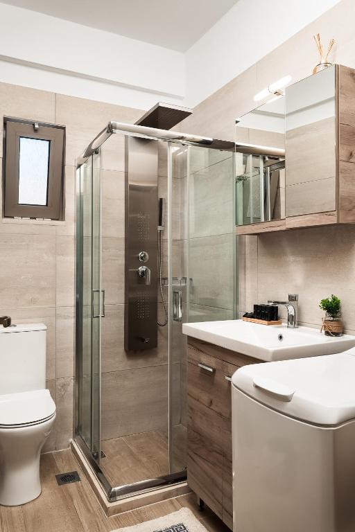 A bathroom at ModernPastel Apartment - Private Parking,Near the Old Port